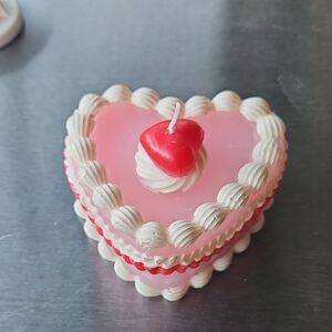 Heart-Shaped Pink Layered Candle with Red Cherry Accent